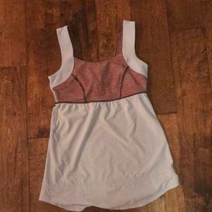 Light blue lululemon tank with pink design on top